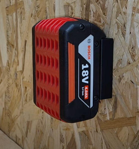 Bosch 18V battery mounted on a Black Power Rack Battery Holder