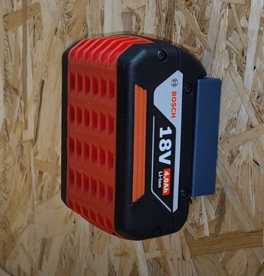 Bosch 18V mounted on Power Rack Blue battery mount on a wooden background